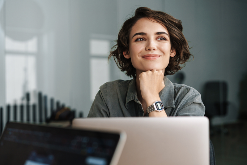 happy woman at laptop