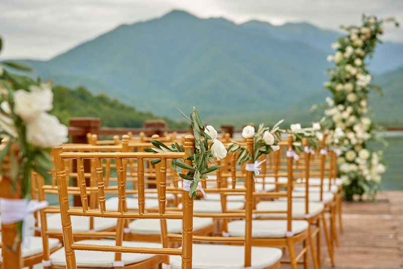 Wedding ceremony setup on the Lake and mountains