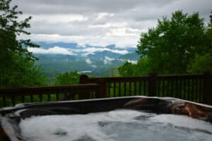 cabin hot tub overlooking mountain view